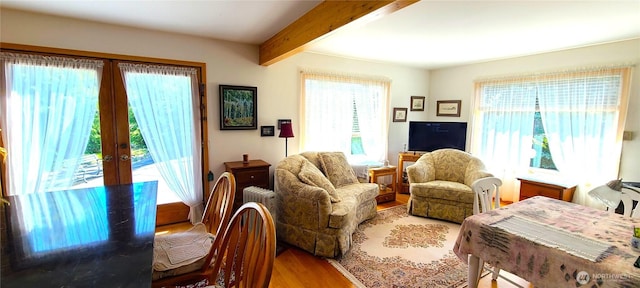 324 Pond Ln, Sequim, WA 98382 - living room featuring light wood-type flooring, beam ceiling, and french doors