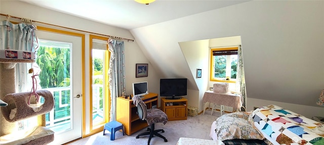 324 Pond Ln, Sequim, WA 98382 - bedroom featuring access to outside, multiple windows, vaulted ceiling, light colored carpet, and an office area
