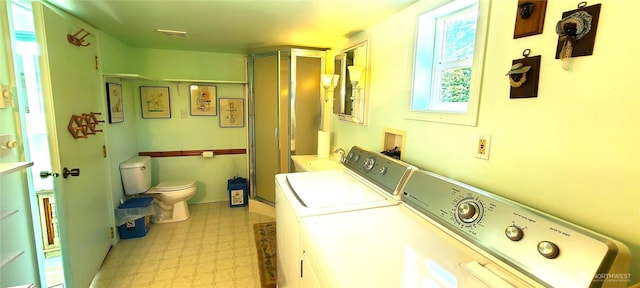 324 Pond Ln, Sequim, WA 98382 - laundry area featuring light flooring and independent washer and dryer