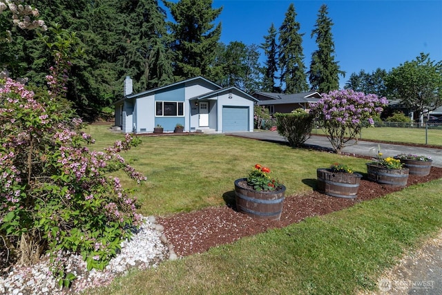 15310 25th St E, Tacoma, WA 98445 - ranch-style house with a garage, driveway, and a chimney
