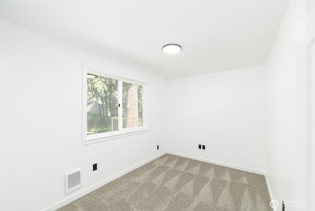 15310 25th St E, Tacoma, WA 98445 - carpeted spare room featuring baseboards