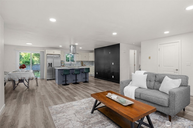 8517 188th Ct E, Puyallup, WA 98375 - living area featuring light wood-type flooring and recessed lighting