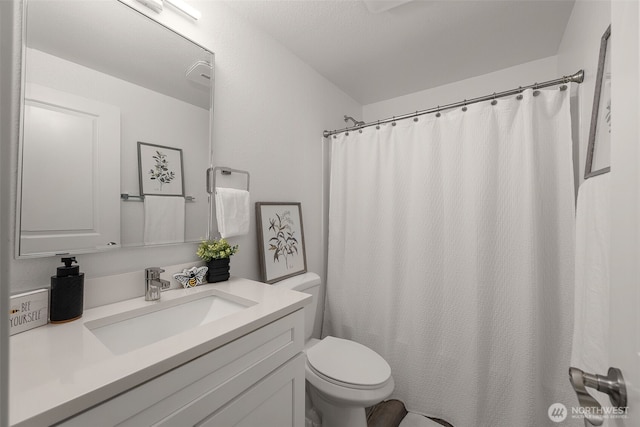 8517 188th Ct E, Puyallup, WA 98375 - full bath with toilet, vanity, and a shower with curtain