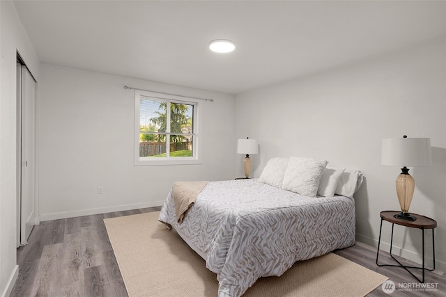 8517 188th Ct E, Puyallup, WA 98375 - bedroom with wood finished floors and baseboards