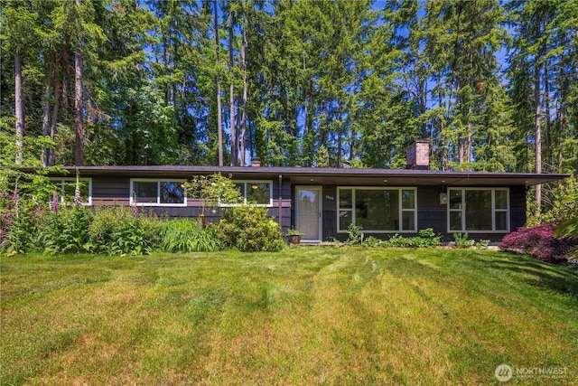 4006 147th Pl SE, Bellevue, WA 98006 - ranch-style home with a front yard and a chimney