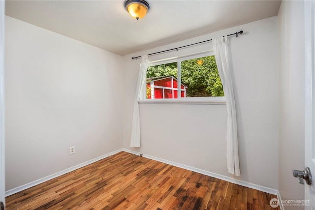 4006 147th Pl SE, Bellevue, WA 98006 - empty room featuring wood finished floors and baseboards