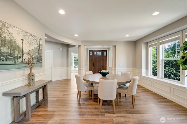 3623 148th St SE, Mill Creek, WA 98012 - dining area with a decorative wall, a wainscoted wall, recessed lighting, and wood finished floors