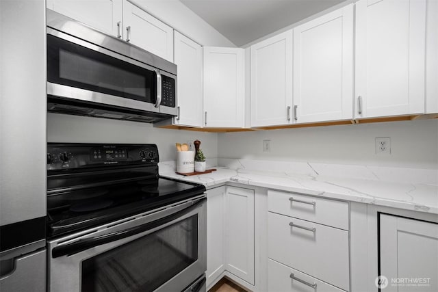 4243 Wintergreen Cir Unit 136, Bellingham, WA 98226 - kitchen with stainless steel appliances, white cabinetry, and light stone counters