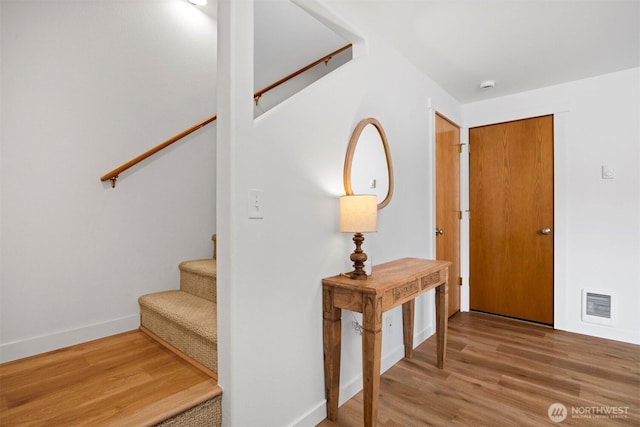 4243 Wintergreen Cir Unit 136, Bellingham, WA 98226 - entryway featuring wood finished floors, stairway, and baseboards