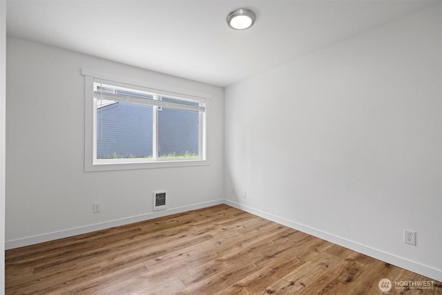 4243 Wintergreen Cir Unit 136, Bellingham, WA 98226 - unfurnished room with wood finished floors and baseboards