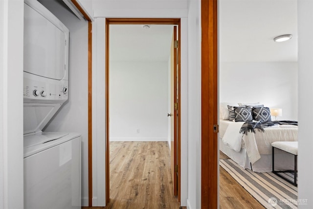 4243 Wintergreen Cir Unit 136, Bellingham, WA 98226 - laundry room with stacked washer / drying machine and wood finished floors