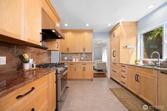 2921 Ellis St, Bellingham, WA 98225 - kitchen featuring stainless steel gas range oven, light brown cabinetry, a sink, under cabinet range hood, and recessed lighting