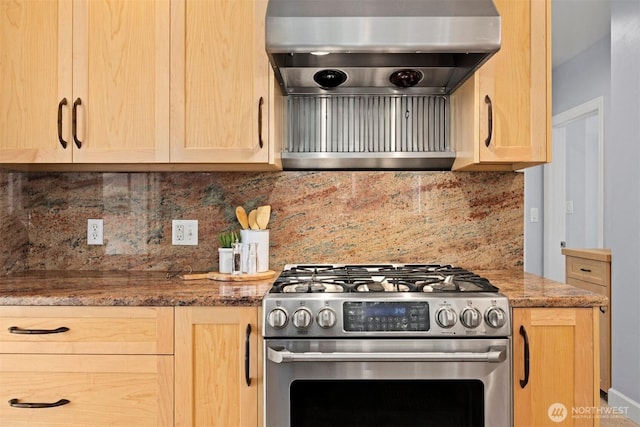 2921 Ellis St, Bellingham, WA 98225 - kitchen with stainless steel gas range oven, light brown cabinets, decorative backsplash, and range hood