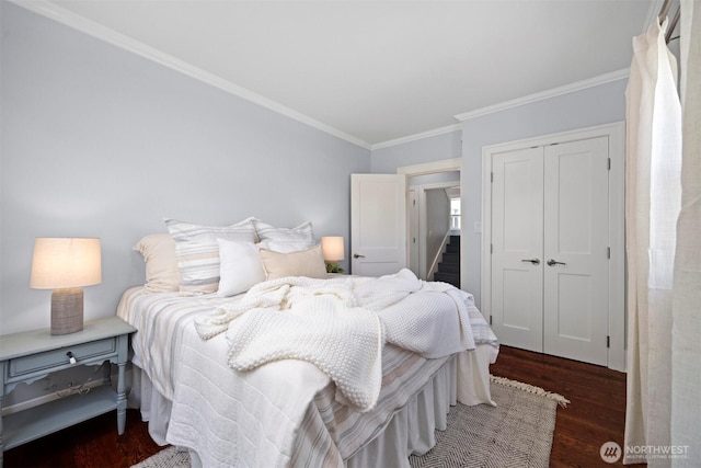 2921 Ellis St, Bellingham, WA 98225 - bedroom featuring a closet, wood finished floors, and crown molding