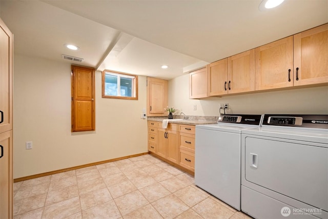 2921 Ellis St, Bellingham, WA 98225 - washroom with independent washer and dryer, cabinet space, baseboards, and recessed lighting