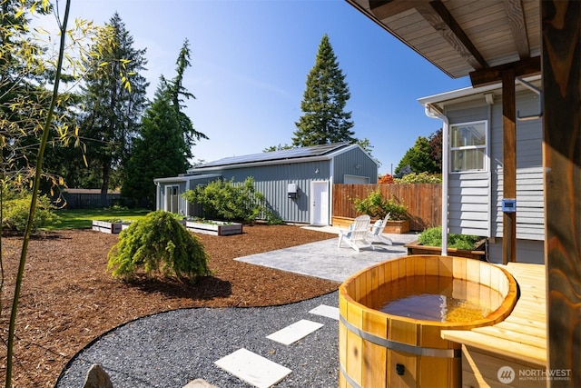 2921 Ellis St, Bellingham, WA 98225 - view of yard featuring a patio and an outbuilding