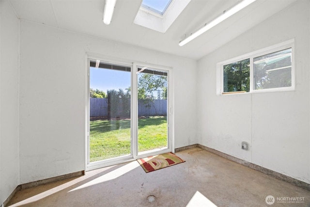 2921 Ellis St, Bellingham, WA 98225 - empty room with a skylight, concrete flooring, plenty of natural light, and lofted ceiling