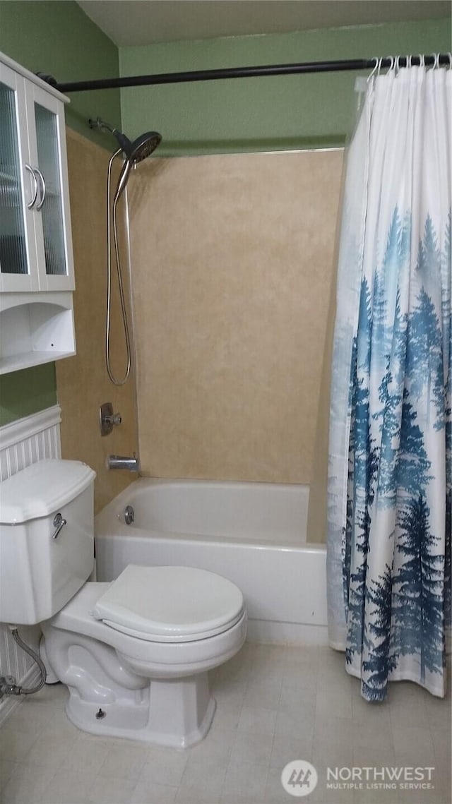 15103 Westmore Dr E, Puyallup, WA 98374 - full bathroom featuring toilet, shower / tub combo, and tile patterned flooring