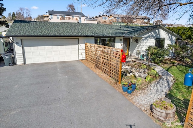 10 Hope Ln, Manson, WA 98831 - view of front of home with driveway, an attached garage, and a shingled roof