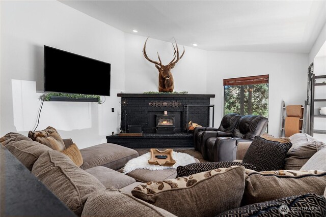5721 Mountain Lane Rd, Peshastin, WA 98847 - living room featuring lofted ceiling, a brick fireplace, and recessed lighting