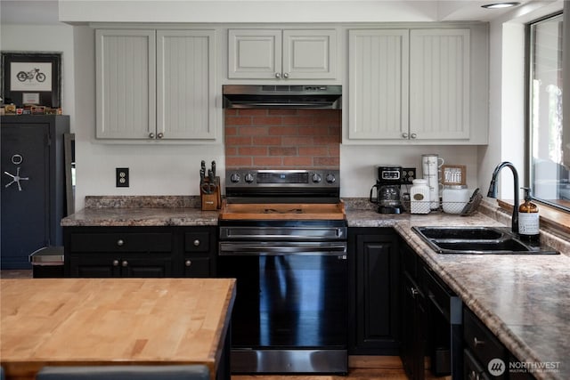 5721 Mountain Lane Rd, Peshastin, WA 98847 - kitchen with stainless steel electric range oven, extractor fan, a sink, decorative backsplash, and wood counters