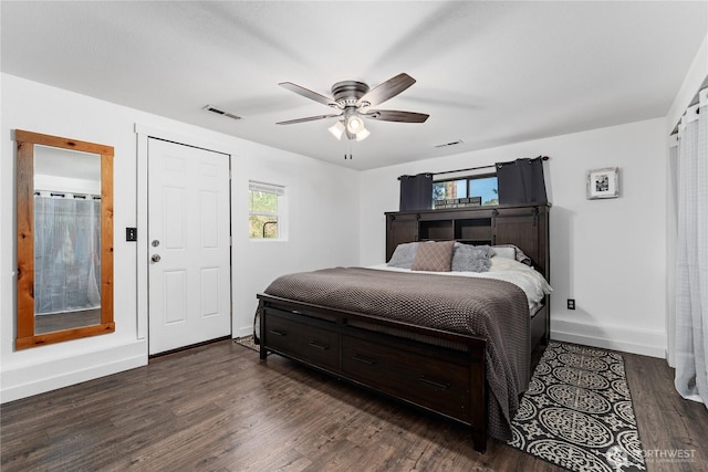 5721 Mountain Lane Rd, Peshastin, WA 98847 - bedroom with baseboards, dark wood-style flooring, and a ceiling fan