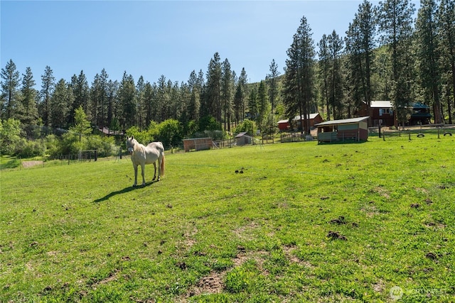 5721 Mountain Lane Rd, Peshastin, WA 98847 - view of yard with an outbuilding and a wooded view