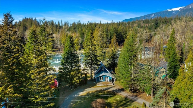 44019 Fir Rd, Gold Bar, WA 98251 - aerial view of property and surrounding area featuring a forest and a mountain backdrop