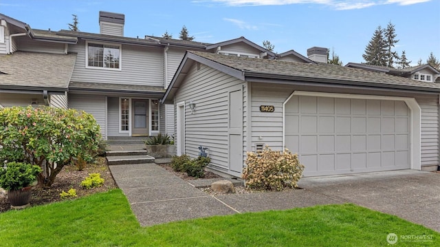 11405 SE 65th St, Bellevue, WA 98006 - view of front of property featuring a chimney, driveway, an attached garage, and roof with shingles