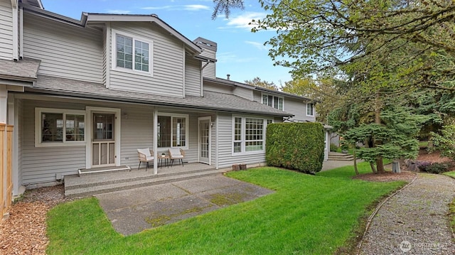 11405 SE 65th St, Bellevue, WA 98006 - rear view of house featuring a yard and a chimney