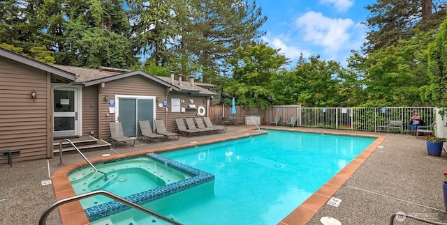 11405 SE 65th St, Bellevue, WA 98006 - view of pool with a patio and a pool with connected hot tub