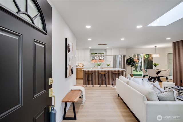30156 2nd Pl SW, Federal Way, WA 98023 - living room with recessed lighting, light wood-style floors, and a skylight