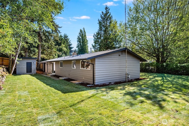 30156 2nd Pl SW, Federal Way, WA 98023 - rear view of house with a lawn and a chimney