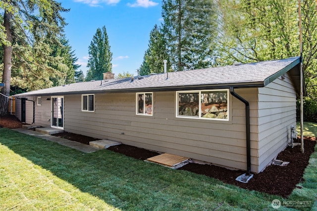 30156 2nd Pl SW, Federal Way, WA 98023 - back of house featuring a lawn, a chimney, and roof with shingles