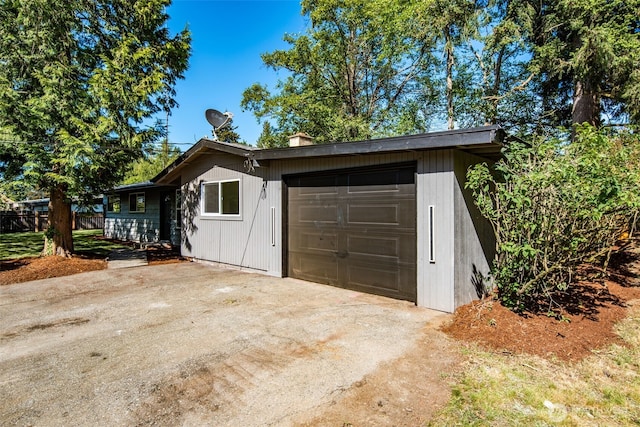 30156 2nd Pl SW, Federal Way, WA 98023 - view of front of house featuring concrete driveway, a chimney, and an attached garage