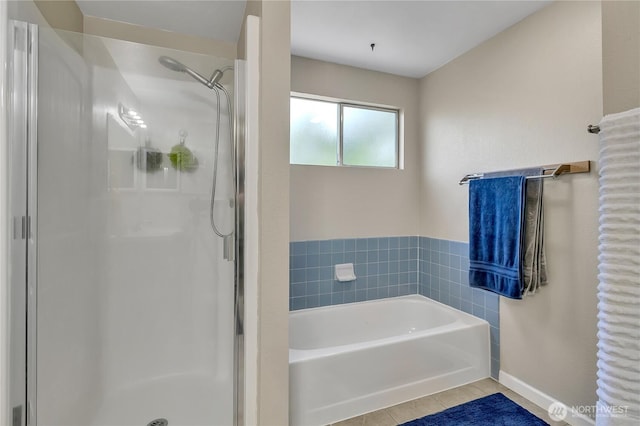 404 Jewell St, Enumclaw, WA 98022 - full bath featuring a stall shower, a bath, tile patterned floors, and baseboards