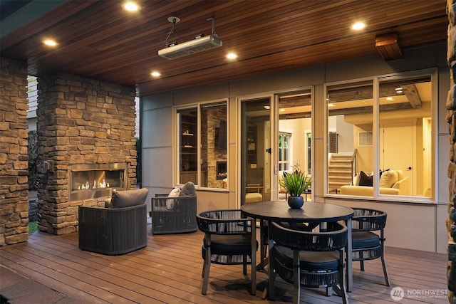 326 7th Ave S, Kirkland, WA 98033 - wooden terrace featuring an outdoor stone fireplace and outdoor dining area