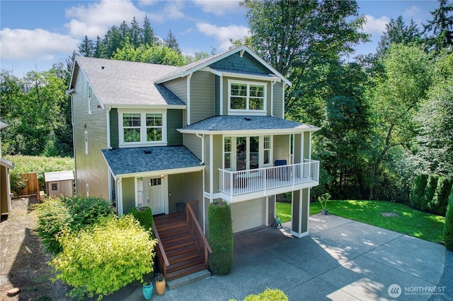 20208 81st Pl NE, Kenmore, WA 98028 - view of front facade featuring concrete driveway, an attached garage, roof with shingles, and stairs