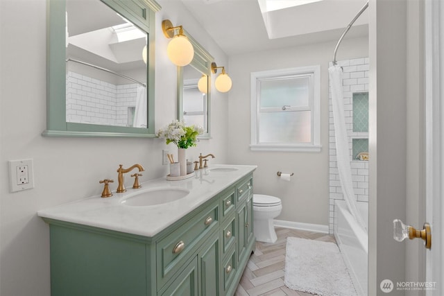 1536 NW 100th St, Seattle, WA 98177 - bathroom with a skylight, double vanity, toilet, shower / bath combo, and baseboards