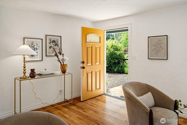 9010 13th Ave SW, Seattle, WA 98106 - foyer entrance with wood-type flooring and baseboards