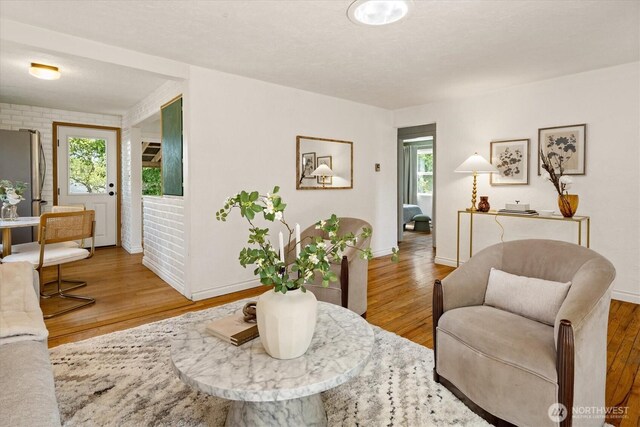 9010 13th Ave SW, Seattle, WA 98106 - living area with wood finished floors and baseboards