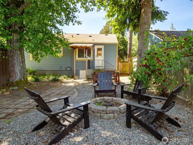9010 13th Ave SW, Seattle, WA 98106 - view of patio / terrace with a fire pit