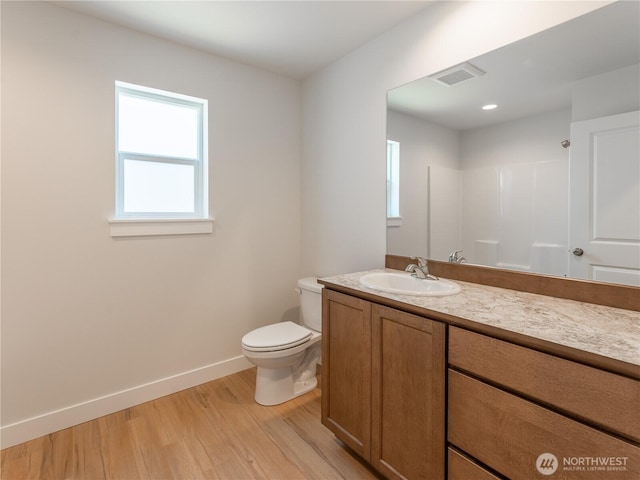 10 Salmon Dr, Wenatchee, WA 98801 - bathroom with vanity, wood finished floors, toilet, and baseboards