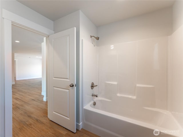 10 Salmon Dr, Wenatchee, WA 98801 - bathroom featuring tub / shower combination, wood finished floors, and baseboards