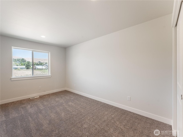 10 Salmon Dr, Wenatchee, WA 98801 - carpeted empty room featuring baseboards and recessed lighting