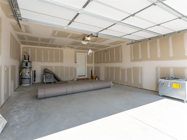 10 Salmon Dr, Wenatchee, WA 98801 - garage featuring water heater and a garage door opener
