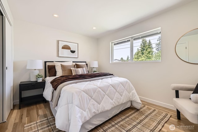 21602 49th Pl W, Mountlake Terrace, WA 98043 - bedroom with light wood-style flooring, baseboards, recessed lighting, and a closet