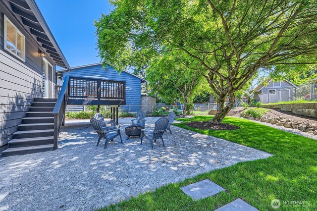 21602 49th Pl W, Mountlake Terrace, WA 98043 - view of patio / terrace featuring stairway, a fire pit, and a wooden deck