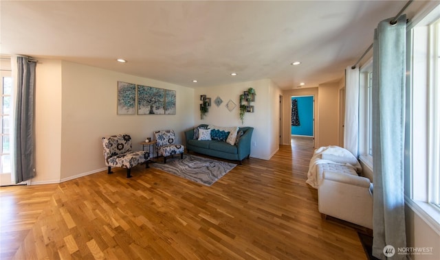 204 76th St SE, Everett, WA 98203 - living area featuring healthy amount of natural light, recessed lighting, baseboards, and light wood-style flooring