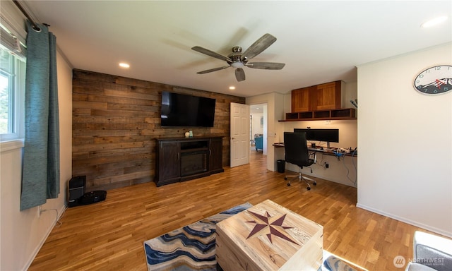 204 76th St SE, Everett, WA 98203 - living area featuring an office area, light wood-type flooring, ceiling fan, a fireplace, and baseboards